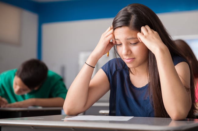 stressed student at desk