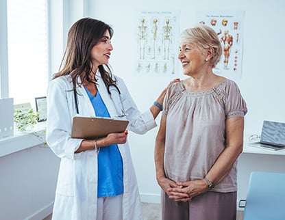 woman speaking to doctor