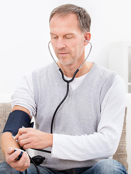 man checking his blood pressure