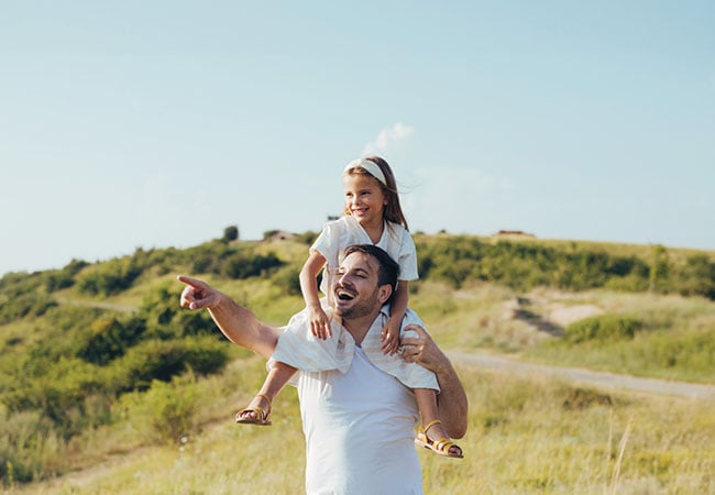 father and daughter hiking
